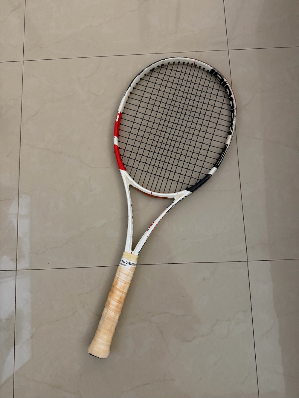 White and Red Tennis Racket - Unbranded High-Performance Racquet